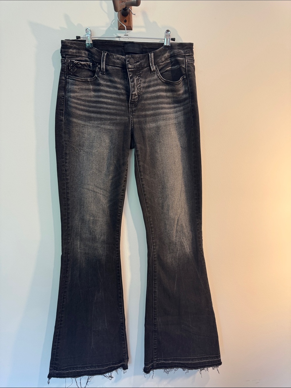 Buckle Black Washed Flare Jeans with Frayed Hem